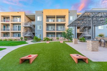 Outdoor cornhole and ping pong